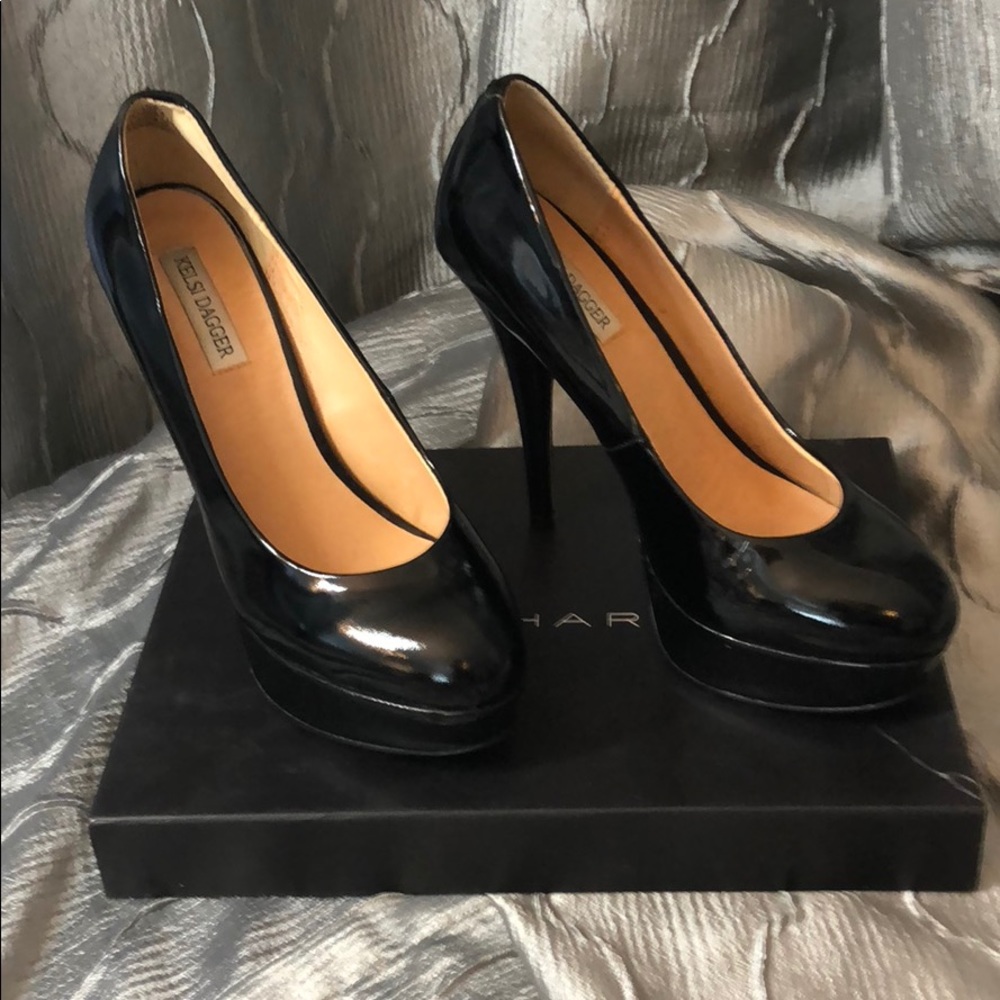 SOLD Black patent platform heels, worn once.